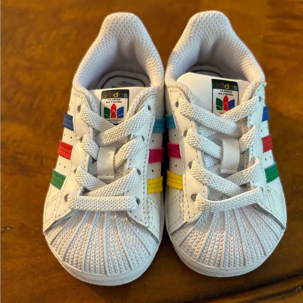 Adidas Superstar Toddler Size 4K with Elastic Ties. Never worn.
